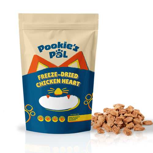 A stand-up pouch of Pookie's Pal Freeze-Dried Chicken Heart cat treats shown on a white background, with a small pile of the brown freeze-dried treats placed beside it.